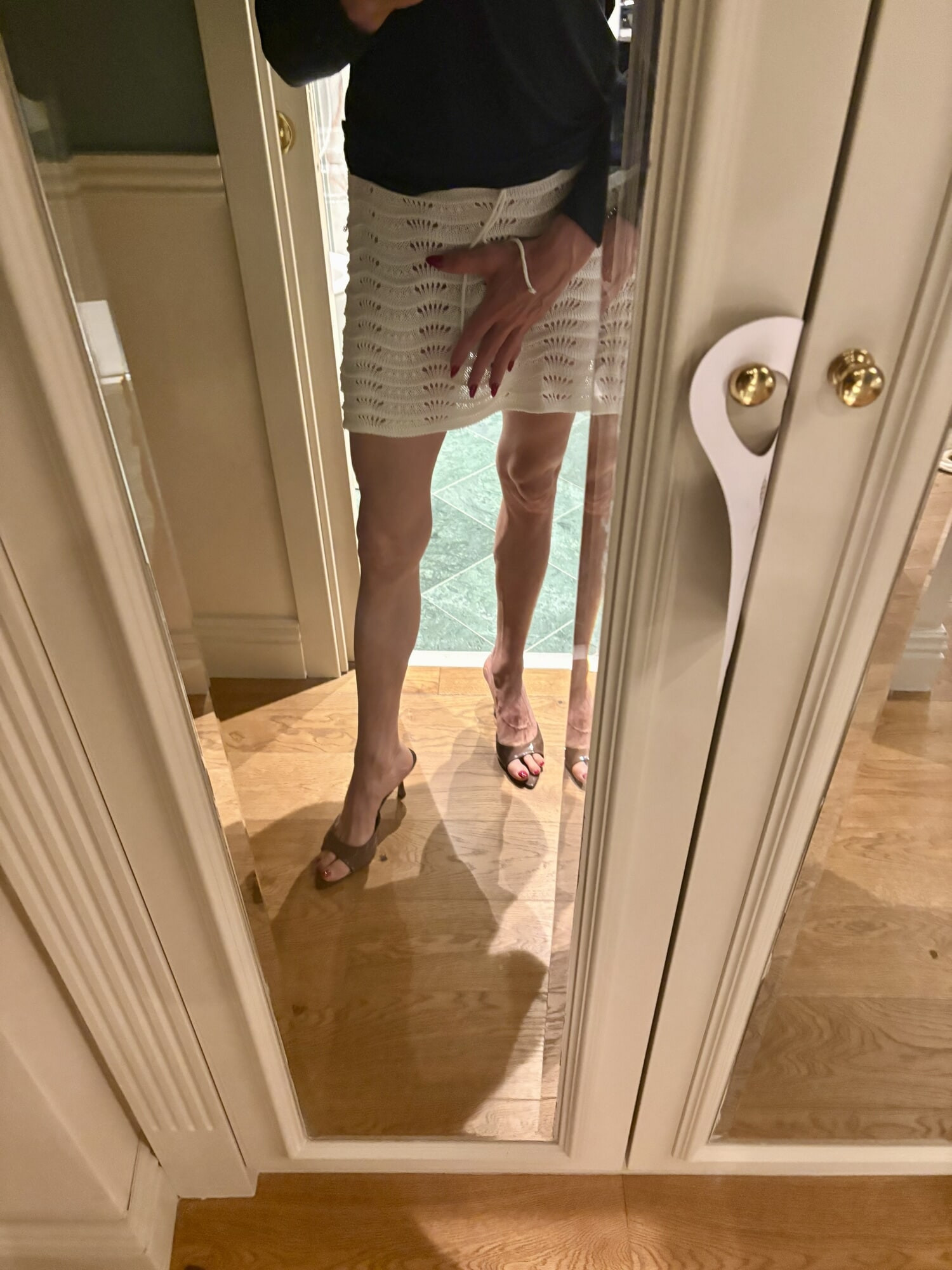 My legs and feet on the mirror