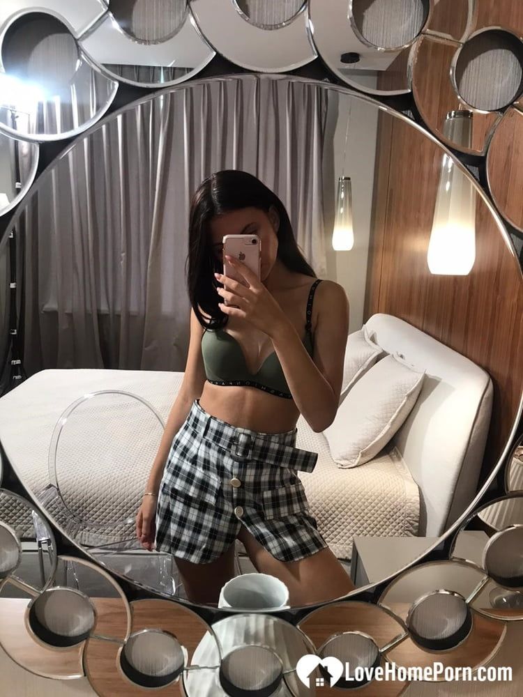 Hot schoolgirl reveals her tits in the mirror #17