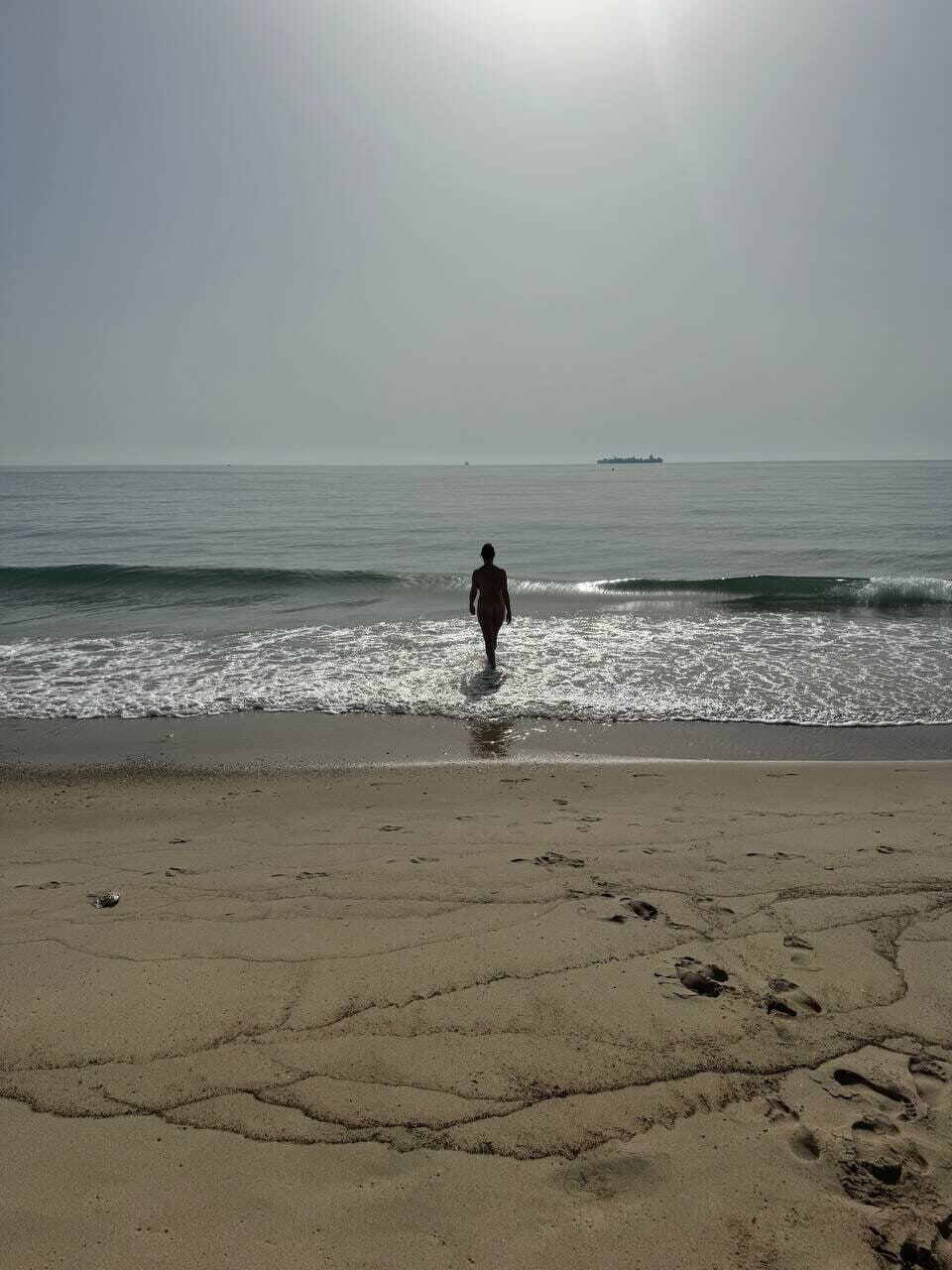 My wife on the beach