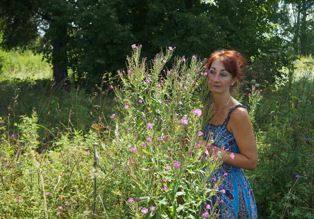 In blue dress in field #5