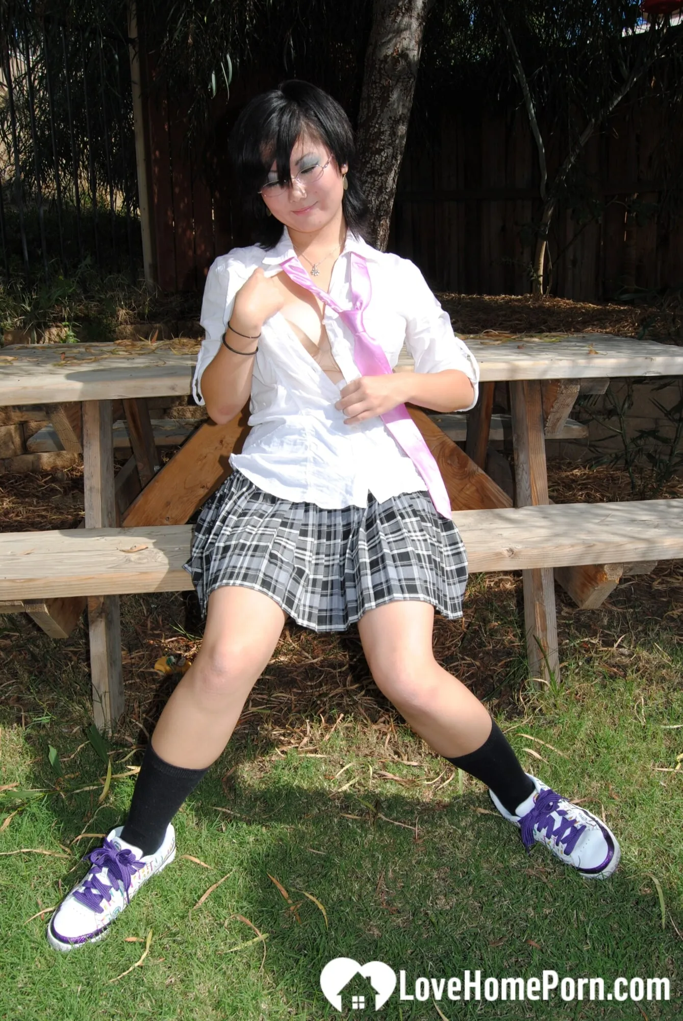 Asian schoolgirl does some hot outdoor teasing