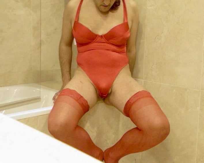 Wetting myself in my red body and stockings oops! #9