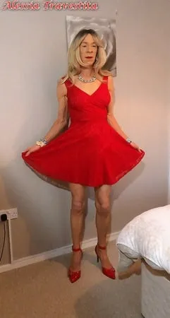    alessia travestita in flirty red dress         