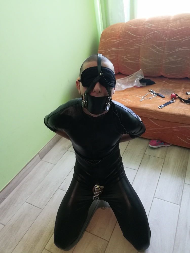 Young slave in latex and chastity cage  #16