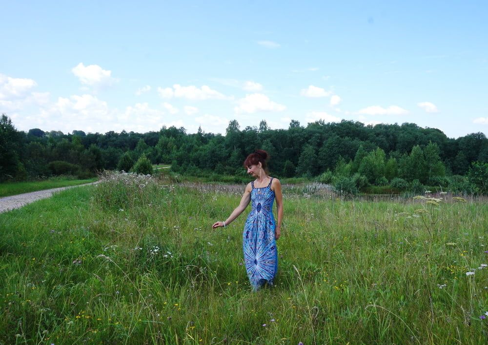 In blue dress in field #42