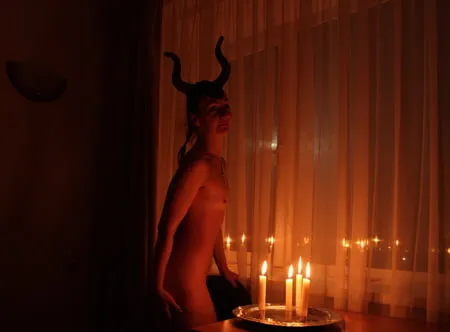 naked maleficent with candles         