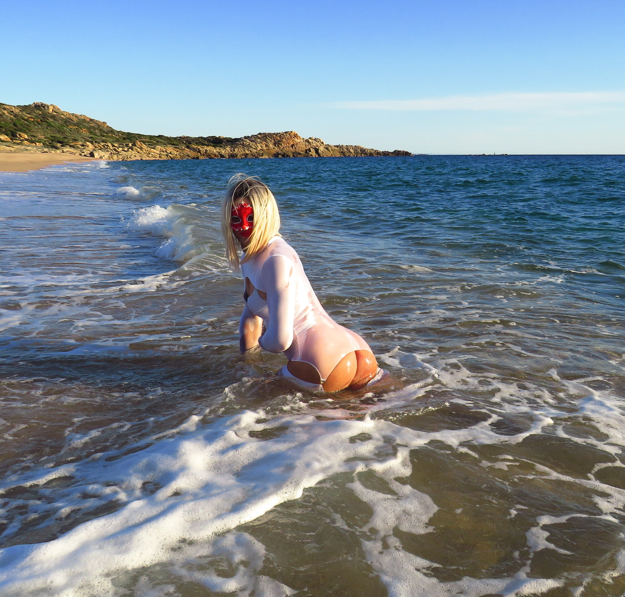 Sexy MILF Blonde shows off her ass on the beach. #24