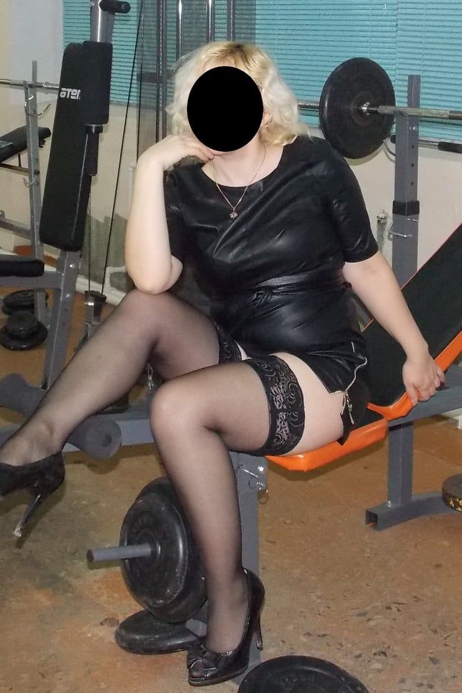 Sexy legs in stockings in the gym
