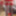 Red corset, stockings, heels, plugged and playing stills #43