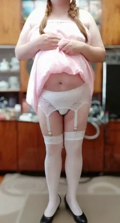 sissy maid posing in white stockings         