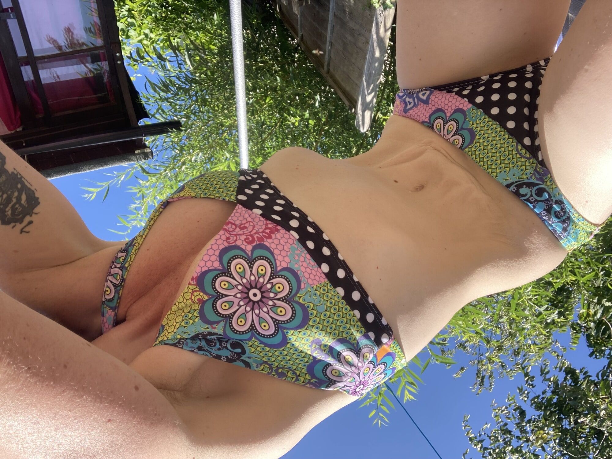 You’re laying in my garden whilst I reach over in a bikini #16