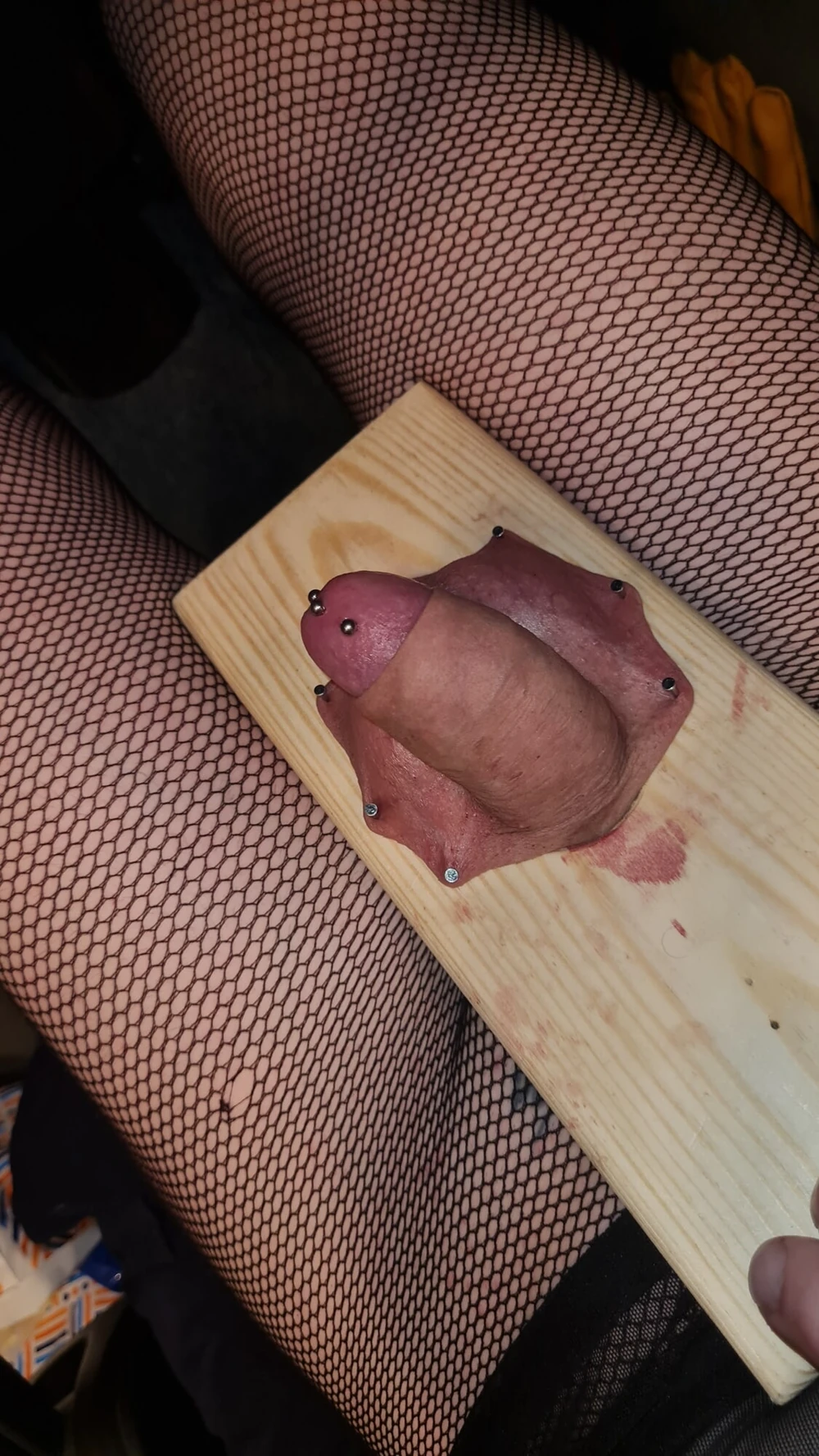 Cock and ball torture