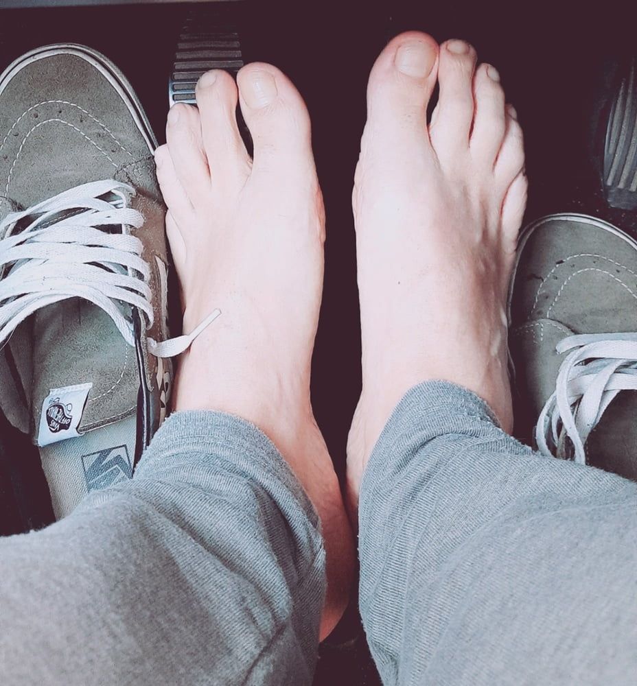 My feet in parking car