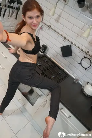 Skinny redhead getting ready for a party         
