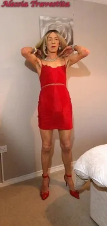    alessia travestita in red velvet dress         