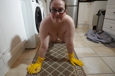 naked cleaning in rubber gloves         