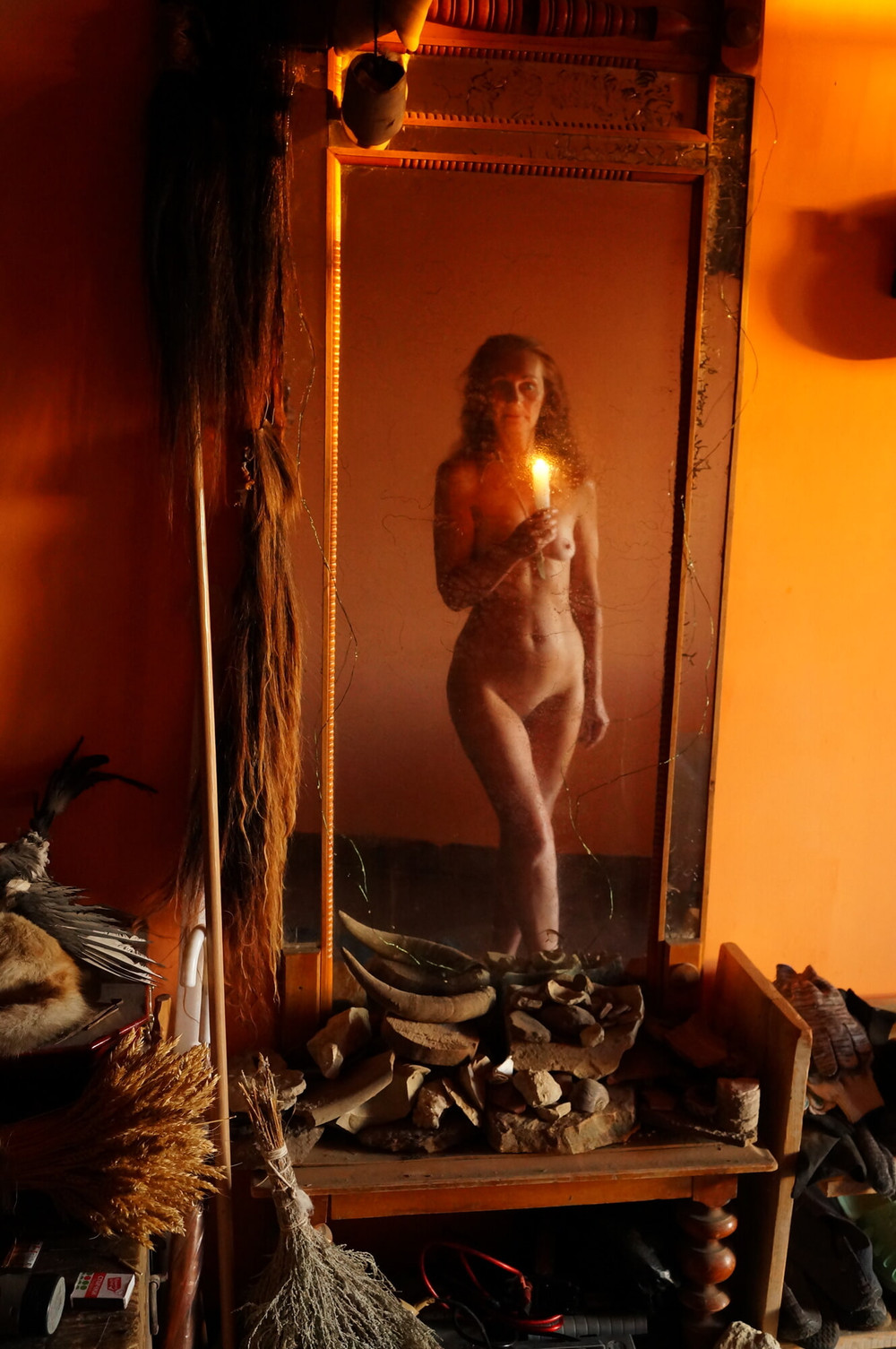 With Candle In antique Mirror