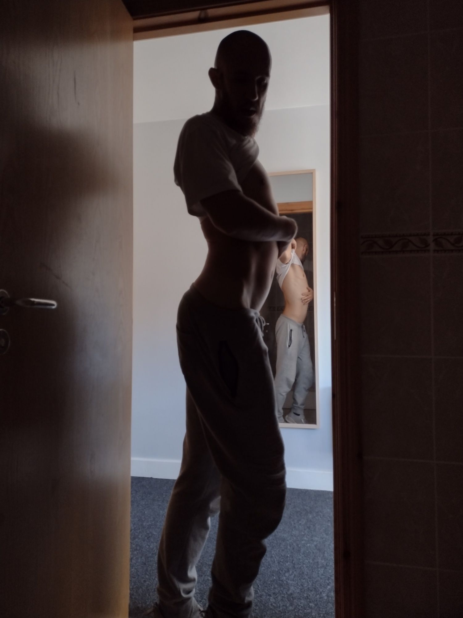 Posing nude in doorway #2