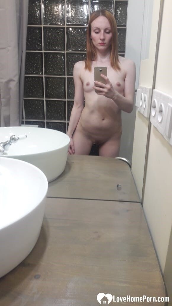 Skinny redhead girl posing in her bathroom naked #9