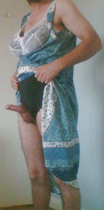 Cross dressing in my wife's clothes.