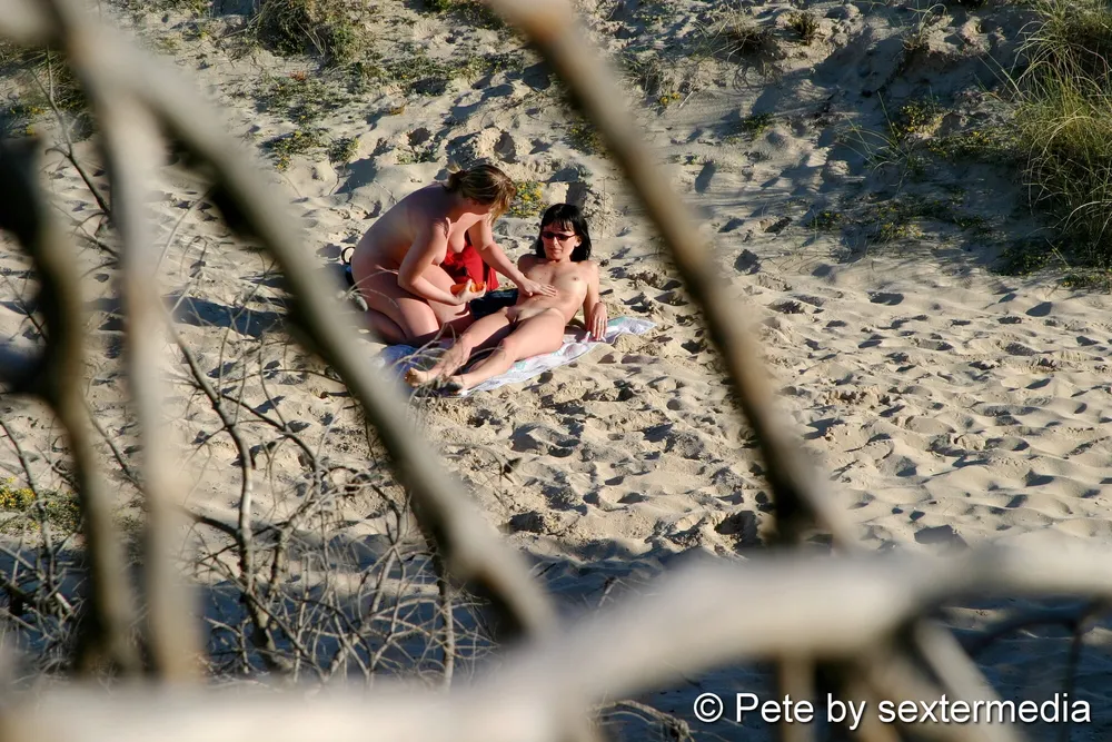 Naked lesbians have fun on the beach #20