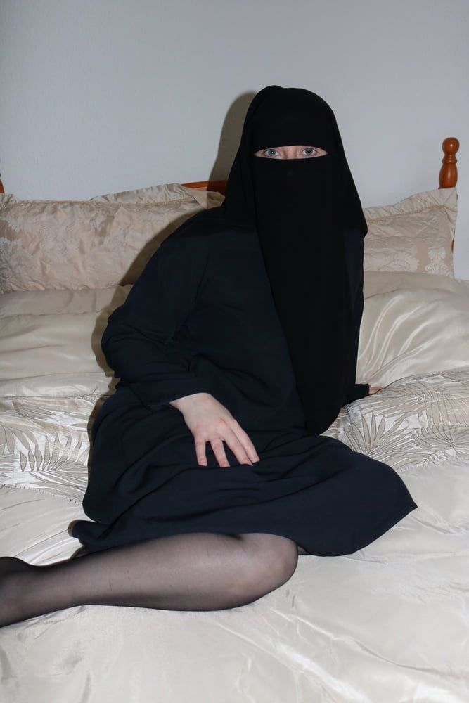 Burqa in stockings and suspenders #2