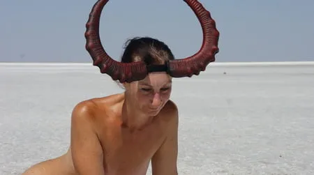 lying naked on the salt of the saltlake elton russia         