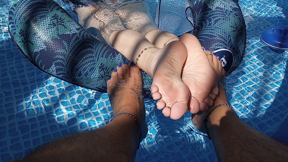 Our feet in the pool #9