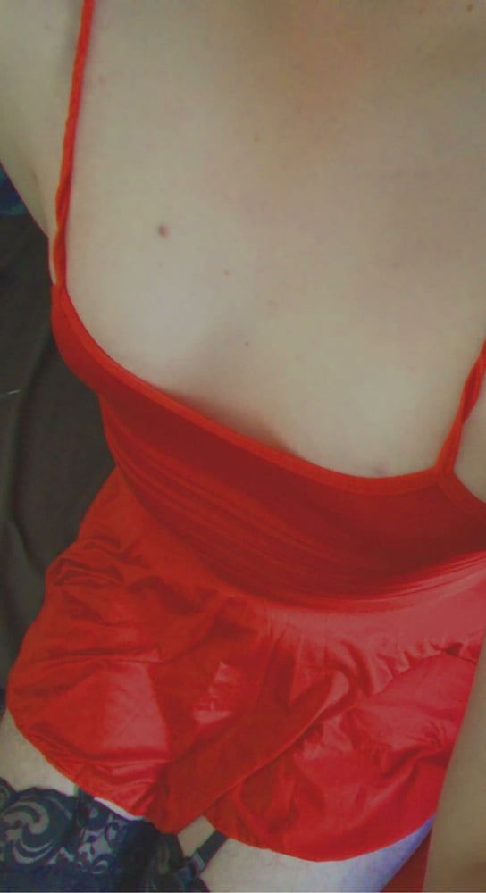 Pretty sissy in red dress and cage
