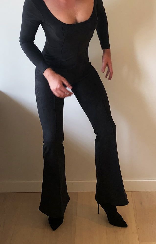 Sissy in black tight jumpsuit