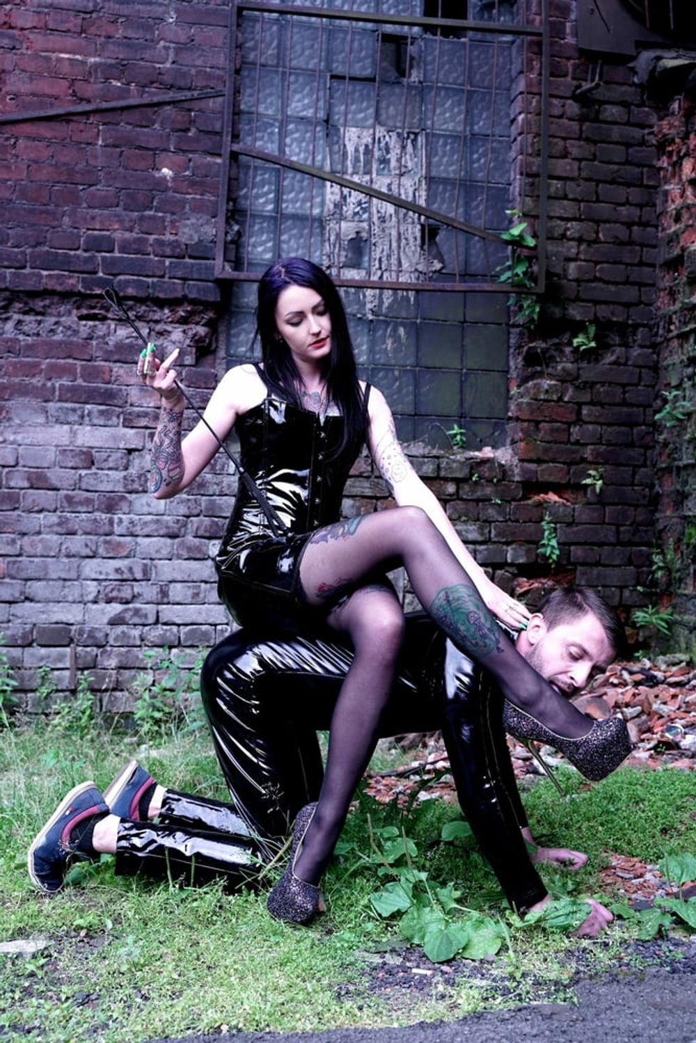 Dominatrix Nika on a walk with her slave. #30