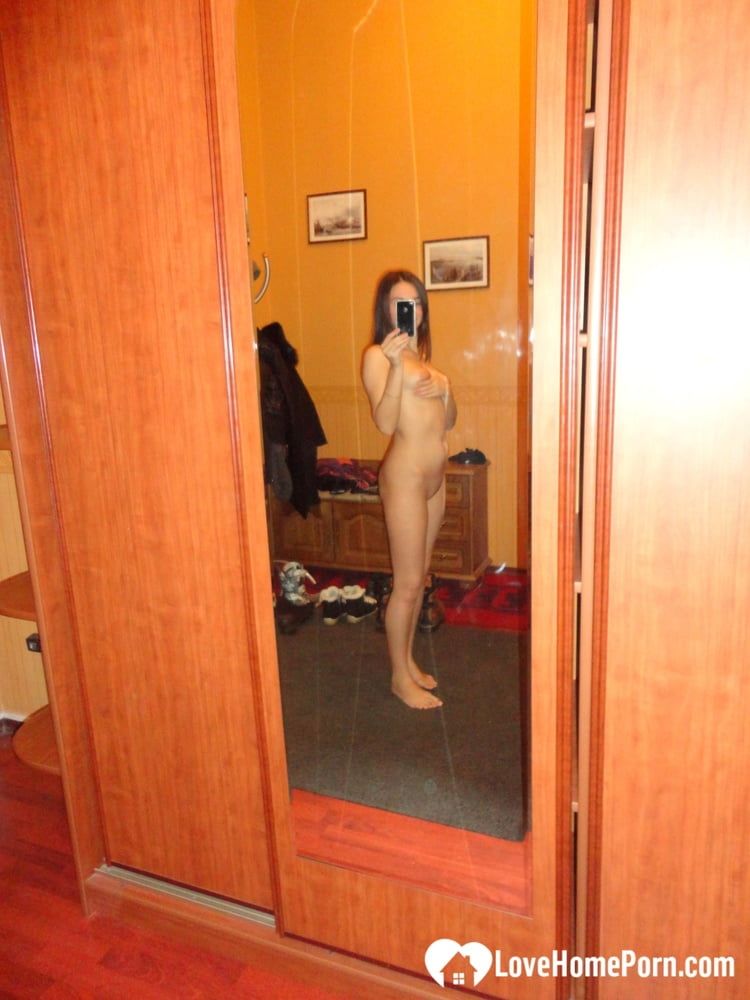 Hot teen shows her body in the mirror #3