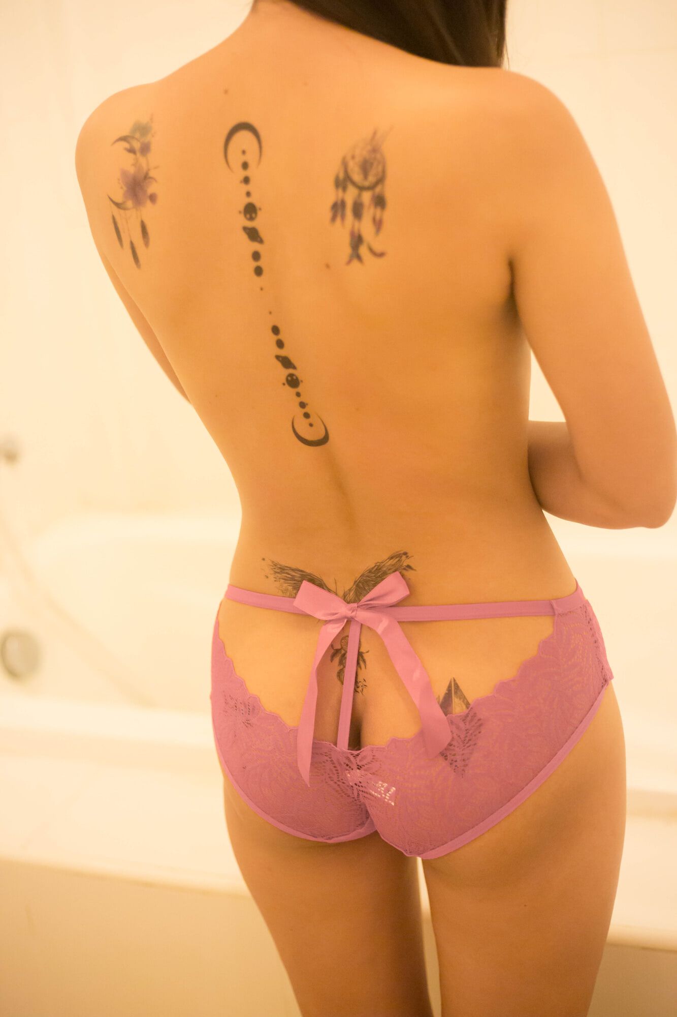 Asian girl and her tattoo in the tub #3