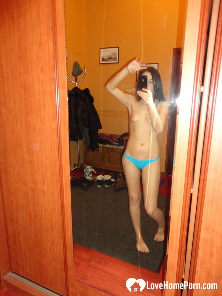 Hot teen shows her body in the mirror #14
