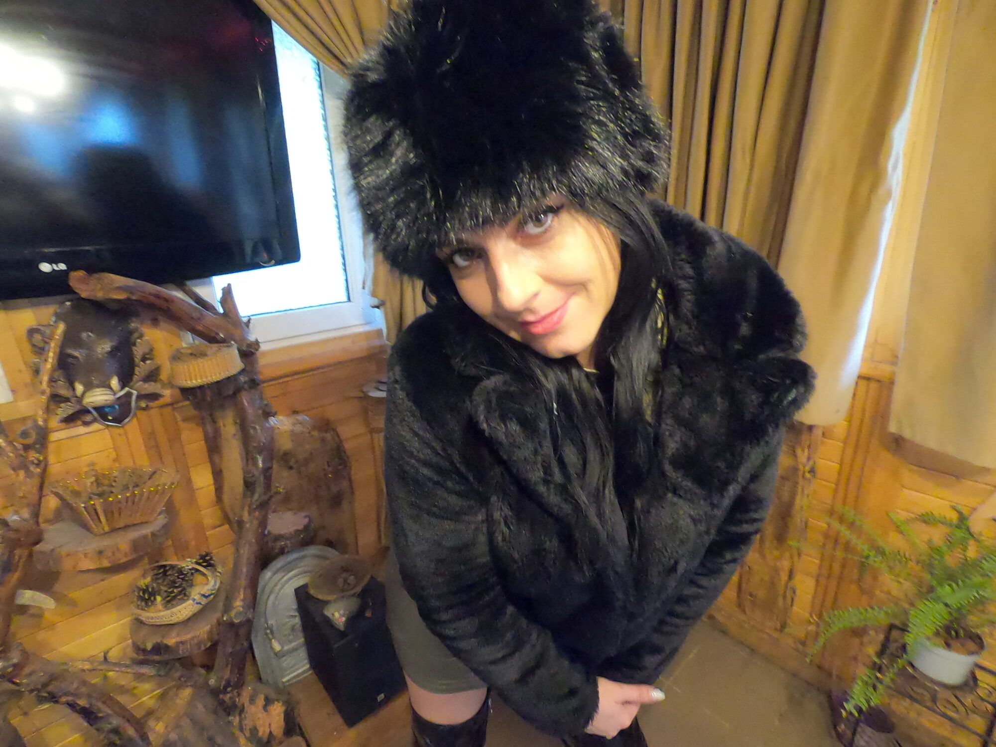 Deep blow-job while wearing fur coat and shiny boots 204