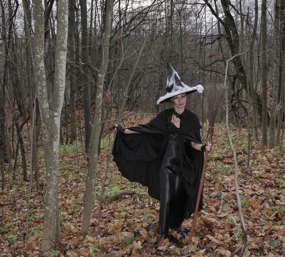 Witch with broom in forest #49