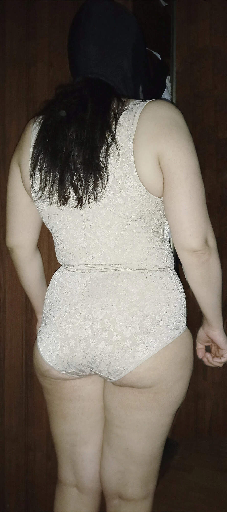 A woman in lingerie and a mask #5