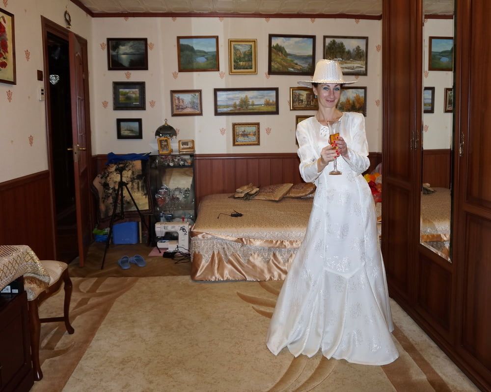 In Wedding Dress and White Hat #2