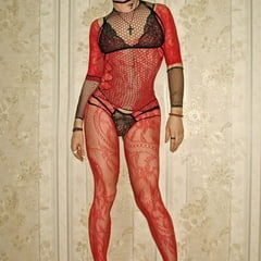 Red bodysuit. High heels.