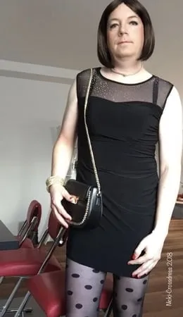 nicki crossdress in a black dress and pantyhose tights         