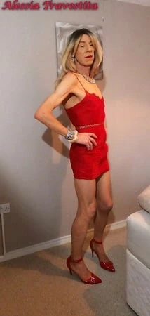    alessia travestita in red velvet dress         