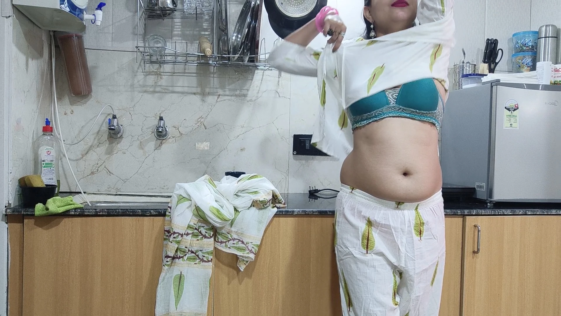 Saara in kitchen playing cards mood 