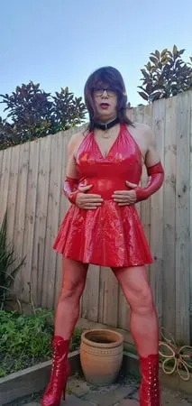 rachel wears red pvc dress         