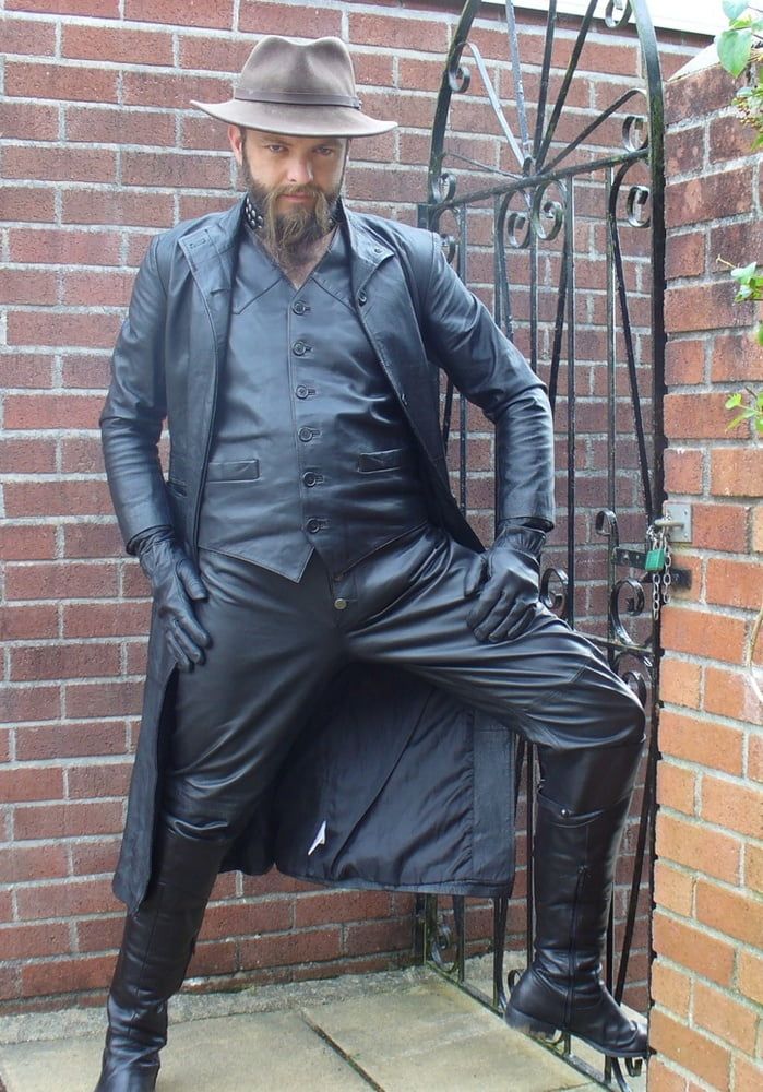 Leather Master outdoors in leather coat and boots #10