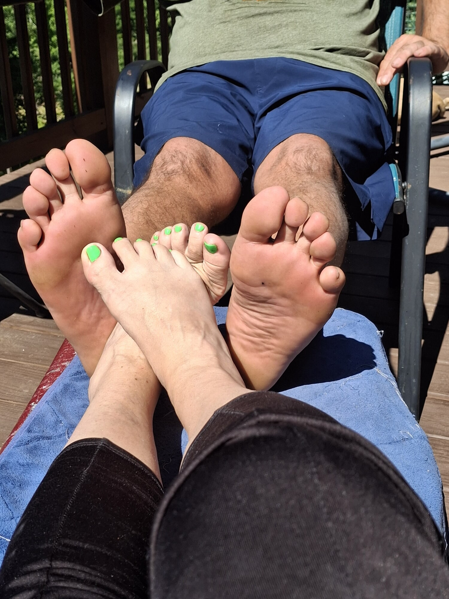 Enjoying some footsie outside on a sunny day