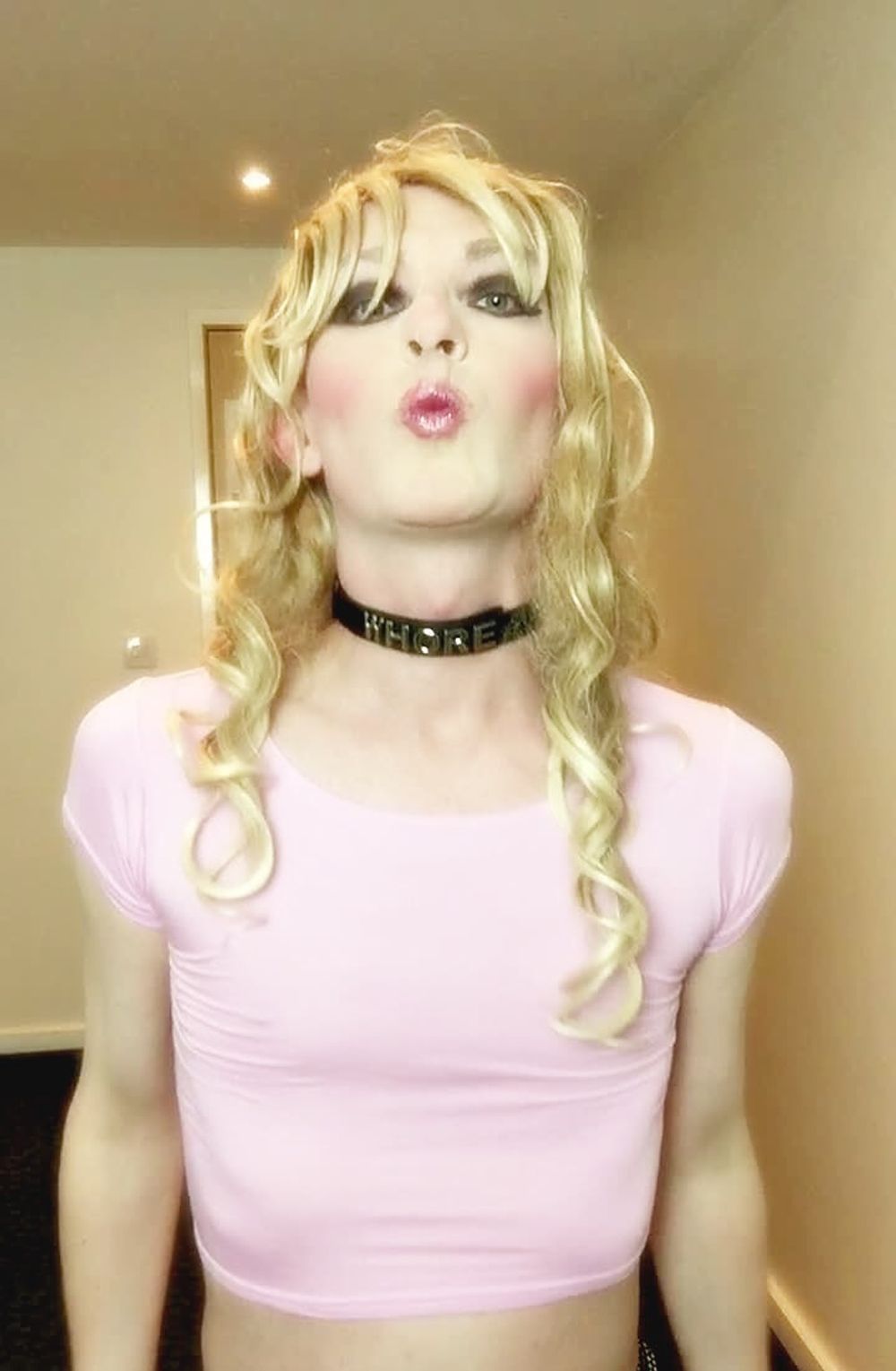 Sissy Sandra in pink top posing #7