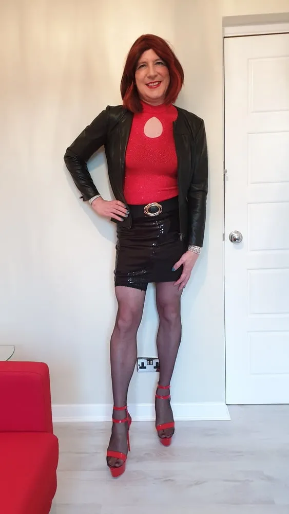 Leather jacket and pink sissy chastity for TGirl Lucy