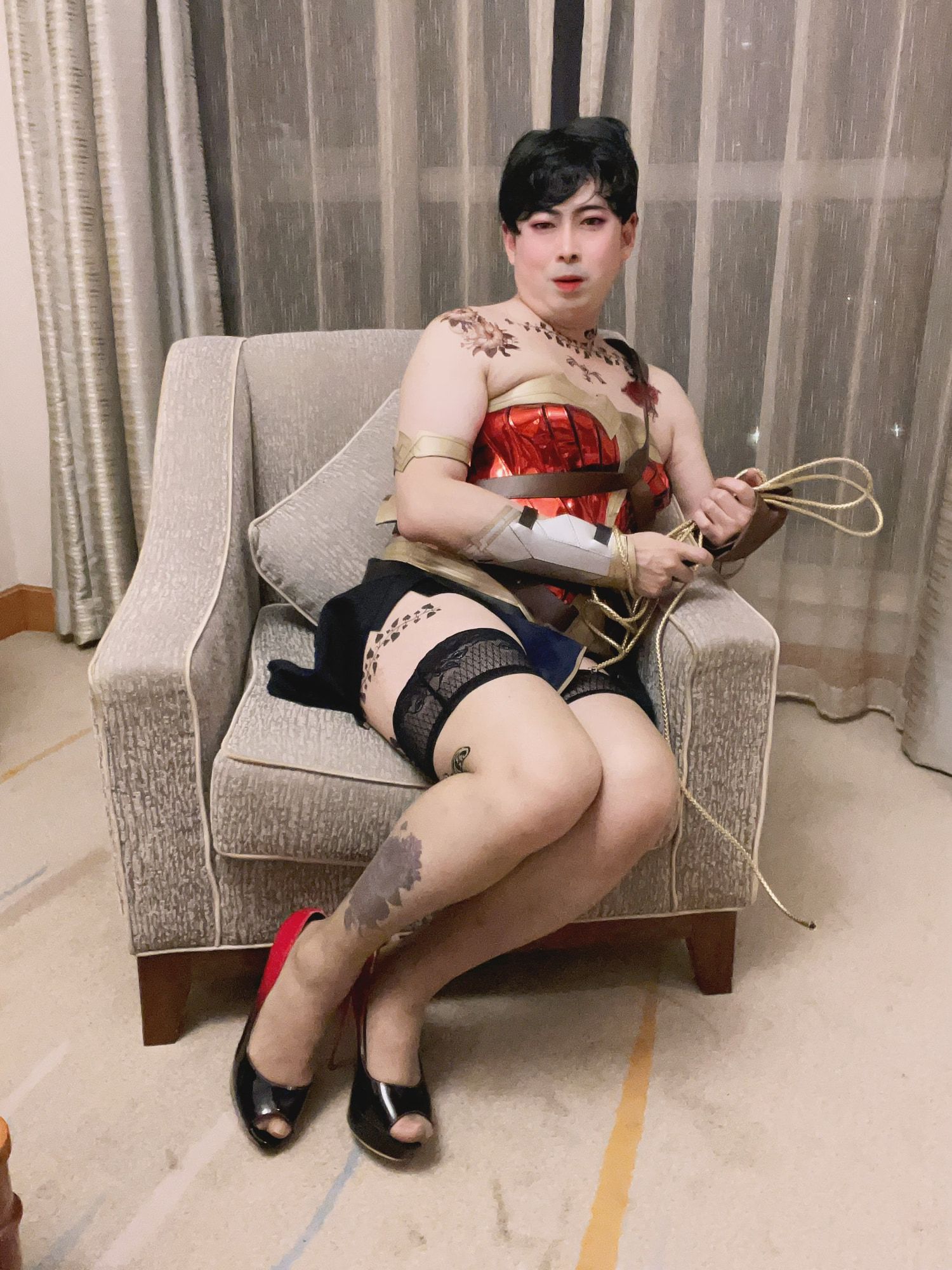 Asian sissy slut in wonder woman custome with tattoo #10