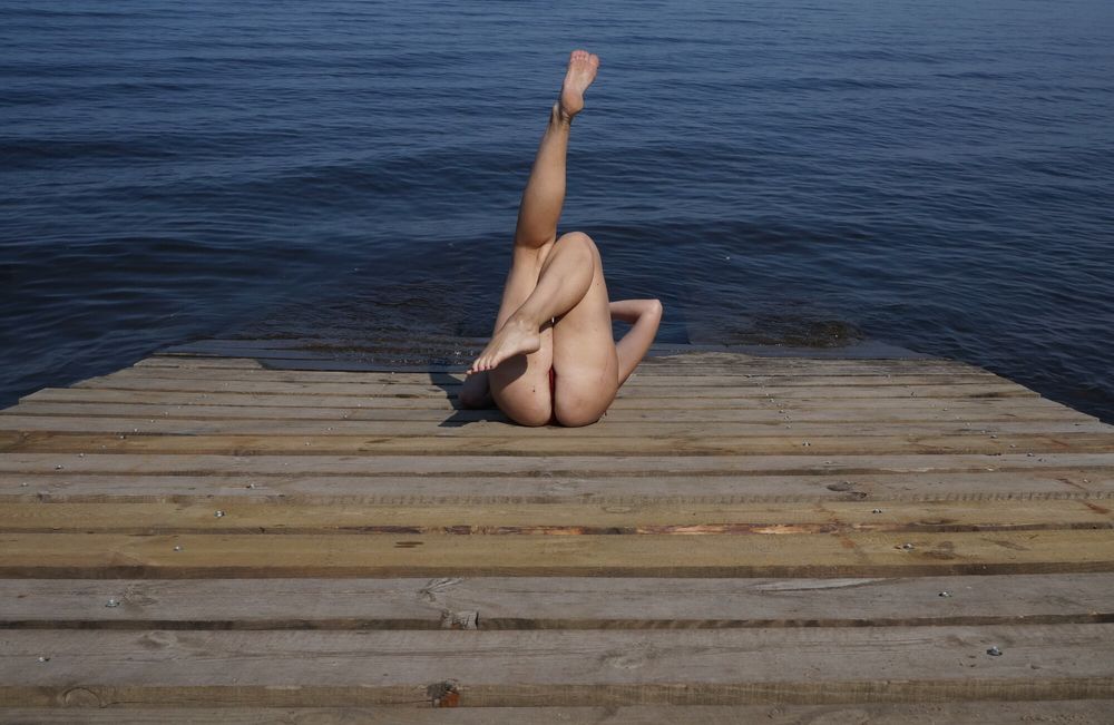 Legs play on a wooden platform #8