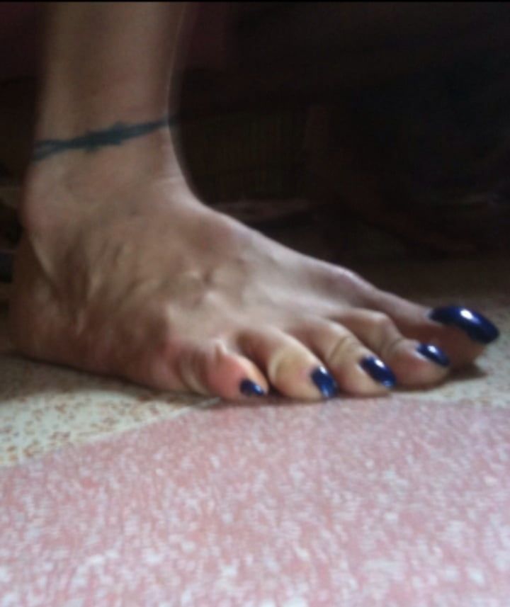 Blue toenails under sun ray #34